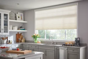 White Alta Roller Shades on the Kitchen Window Above the Sink.