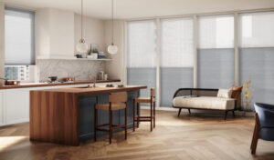 Grey honeycomb shades in kitchen windows.